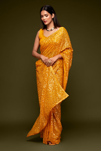 Yellow designer sequins saree for wedding and reception