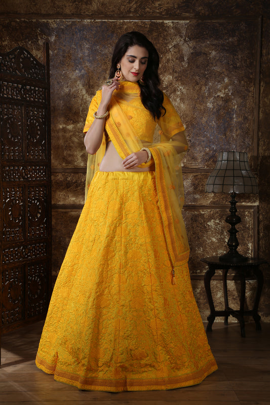 Yellow color designer lehenga choli for haldi function