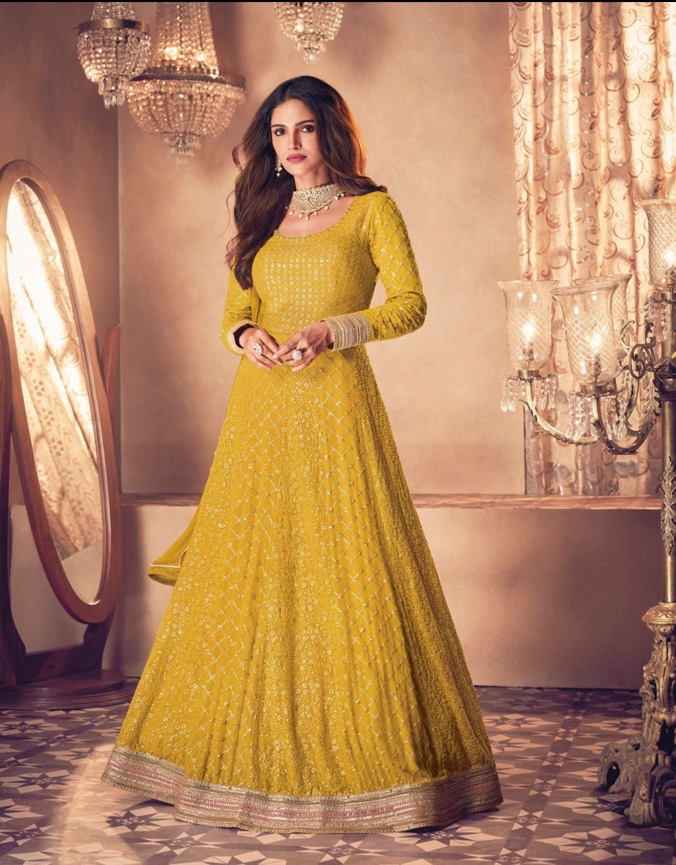 Yellow color fancy designer gown for wedding functions - Joshindia
