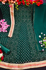 Green color fancy designer gown for wedding functions - Joshindia
