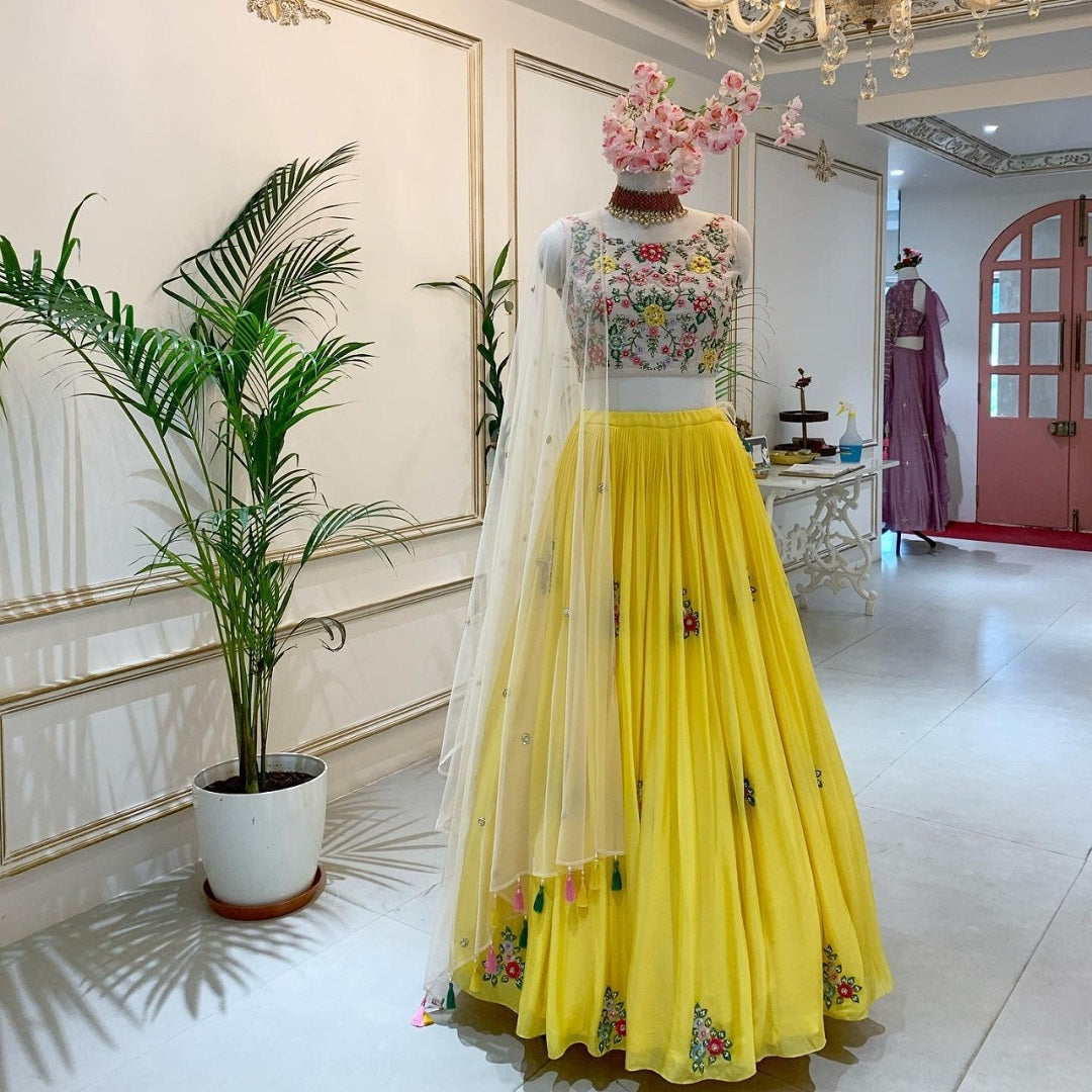 Cream color georgette designer saree for wedding function