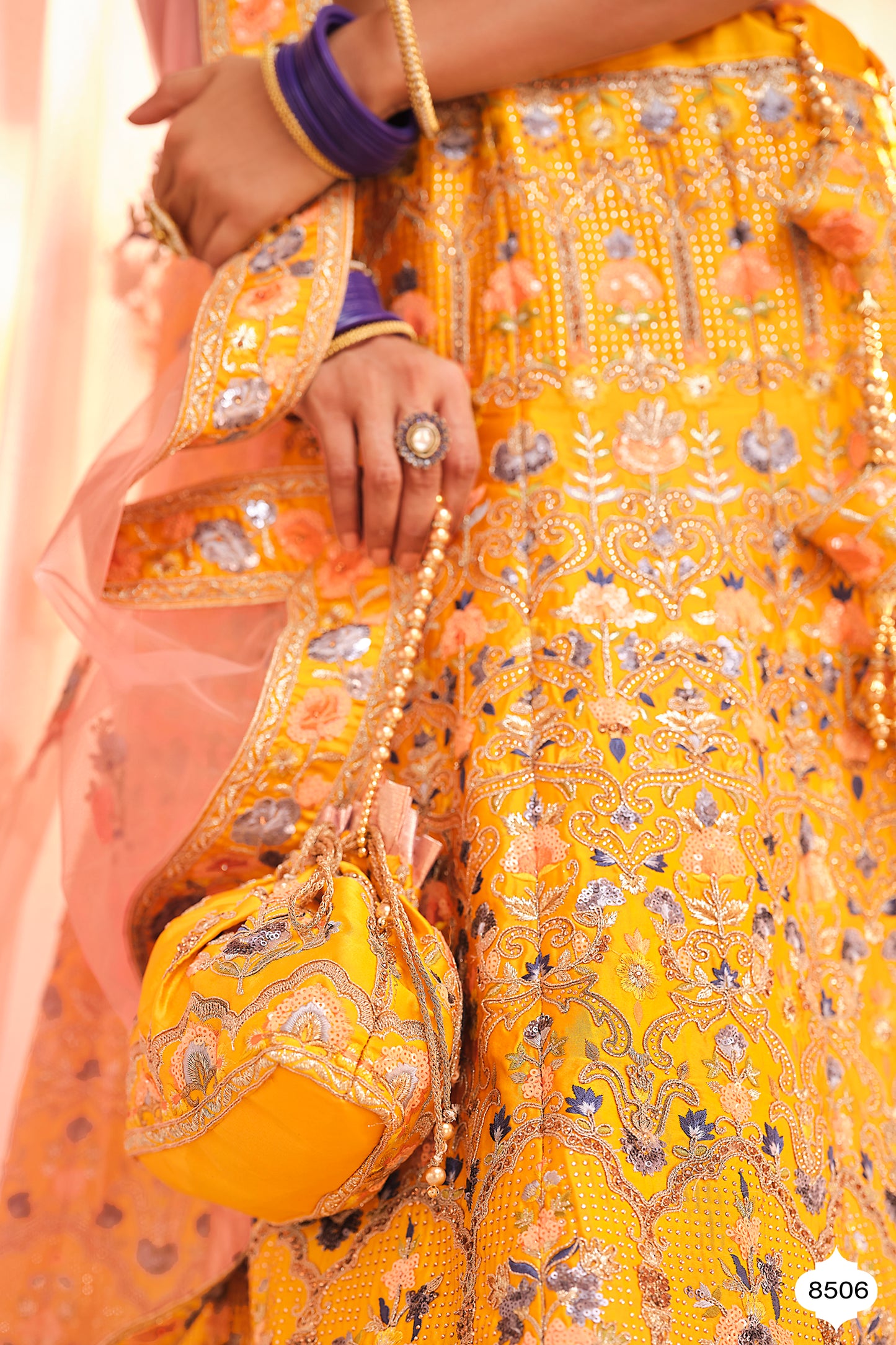 Yellow color heavy bridal lehenga for wedding function