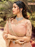 Peach color heavy designer lehenga for engagement and wedding - Joshindia