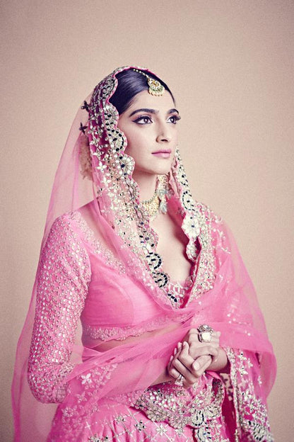 Pink color partywear designer lehenga choli for wedding buy now