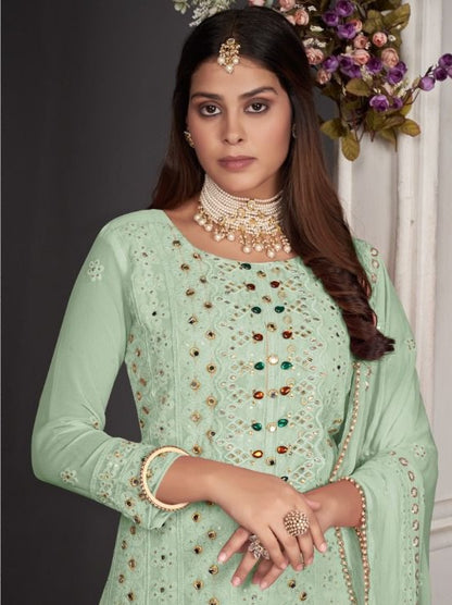 Pisat color Faux Gerogette With Embroidery Work Staright Salwar Suit