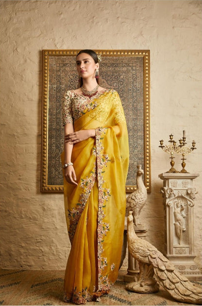 Yellow color heavy designer saree for rich look