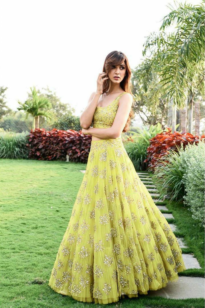 Trendy yellow color ruffle lehenga choli for wedding function - Joshindia
