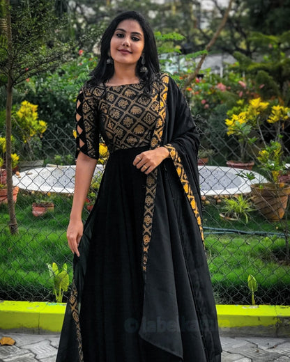 Black color designer gown for royal look