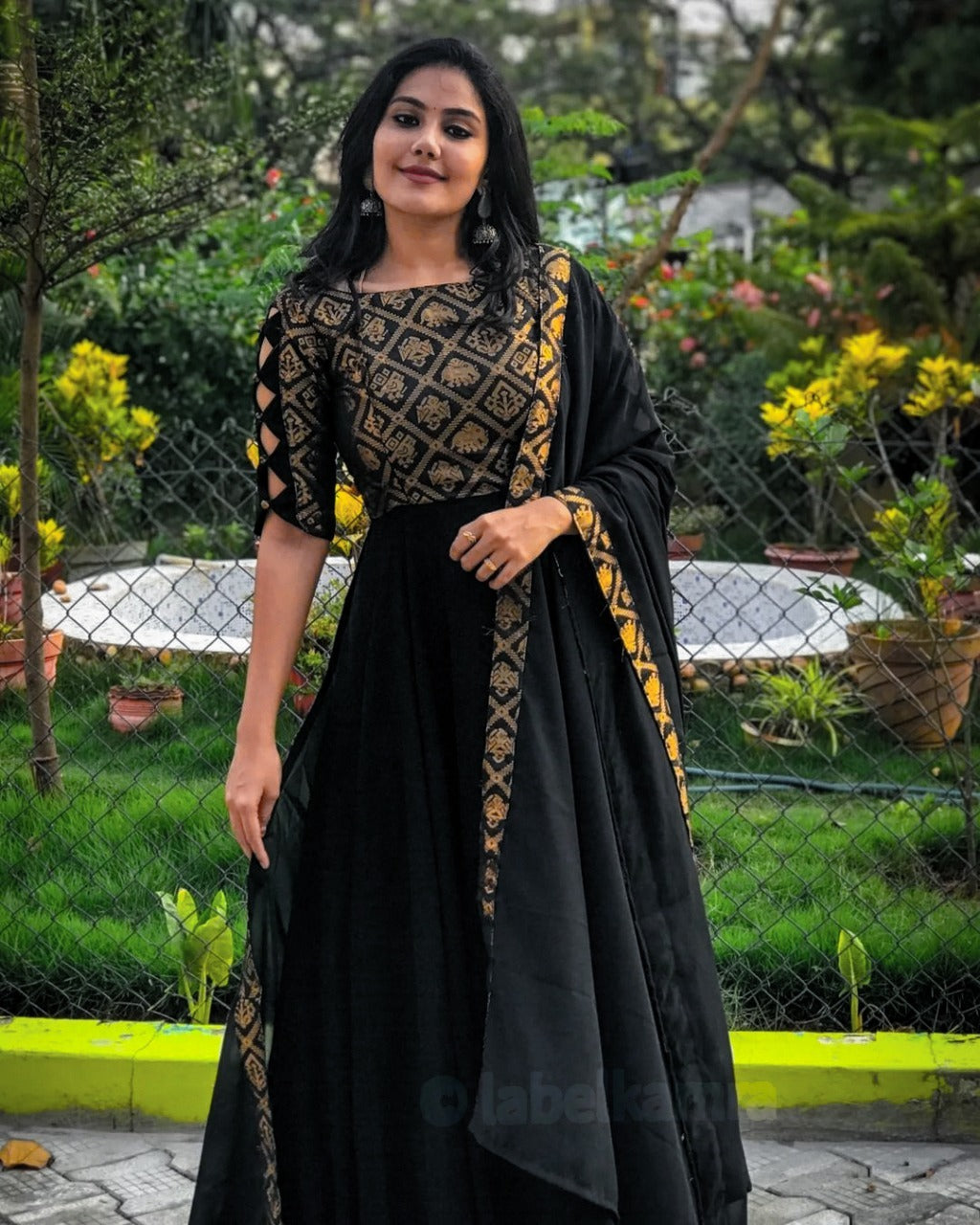 Black color designer gown for royal look - Joshindia