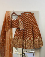 Orange color trendy designer lehenga choli for attractive looks - Joshindia