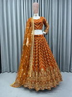 Orange color trendy designer lehenga choli for attractive looks - Joshindia