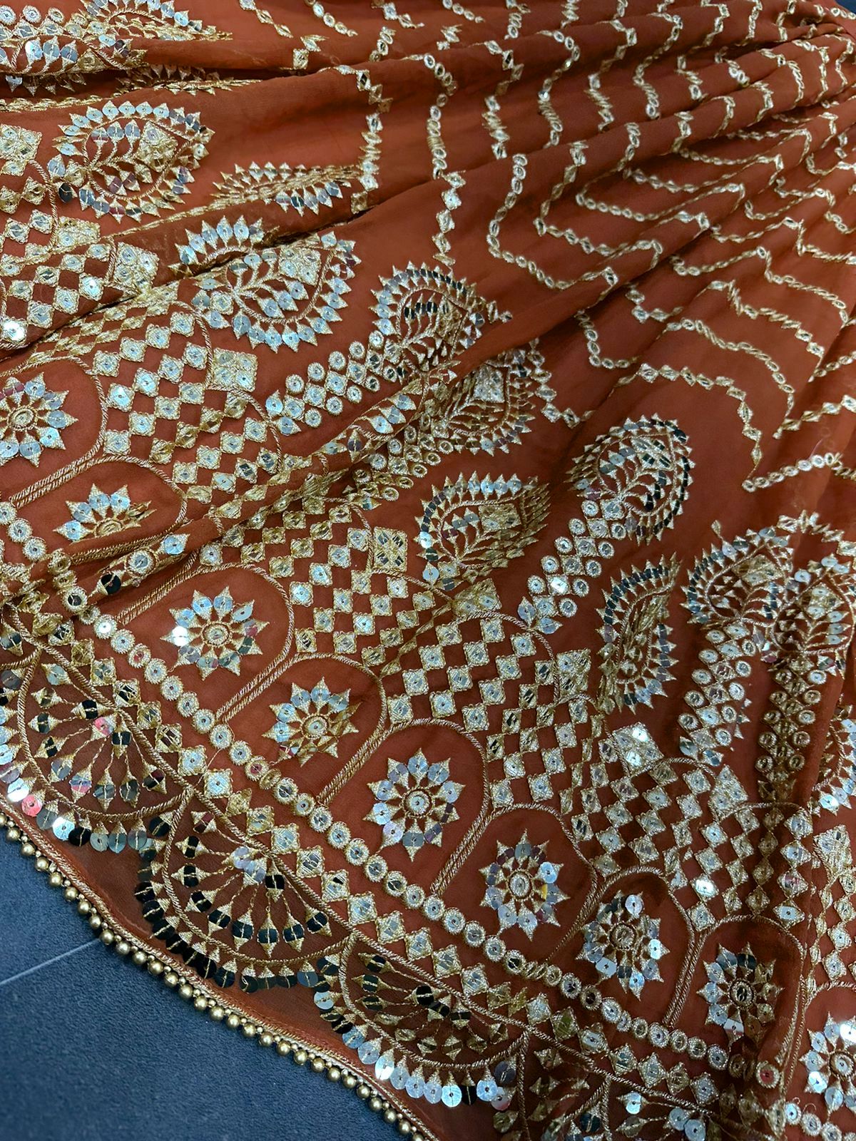 Orange color trendy designer lehenga choli for attractive looks - Joshindia
