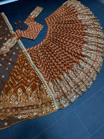 Orange color trendy designer lehenga choli for attractive looks - Joshindia