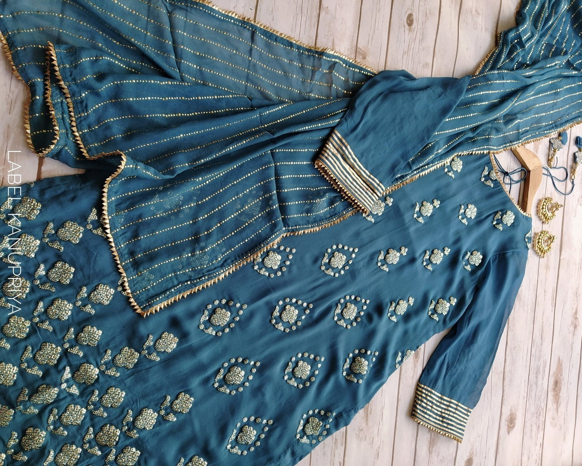 Beautiful turquoise blue color georgette stylish salwar suit - Joshindia