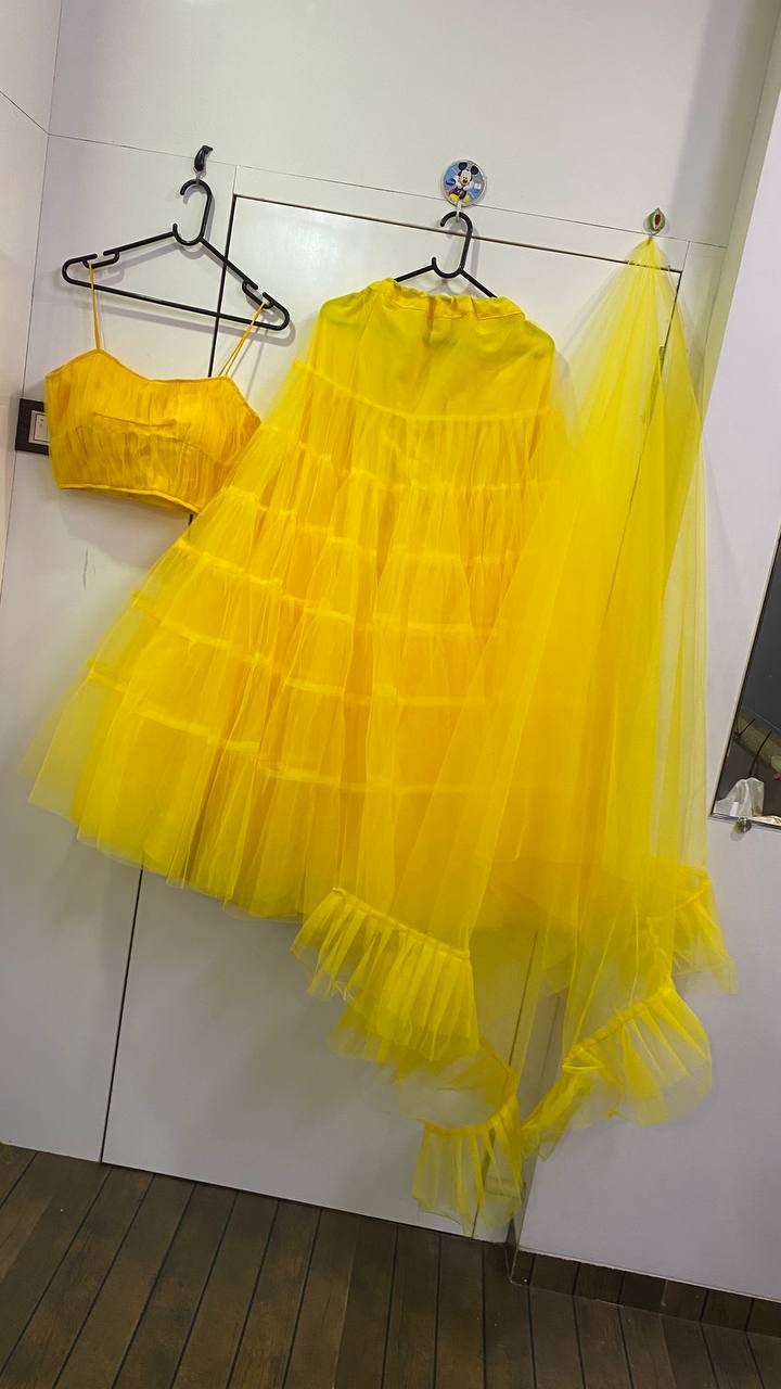 Yellow color designer ruffle lehenga choli - Joshindia