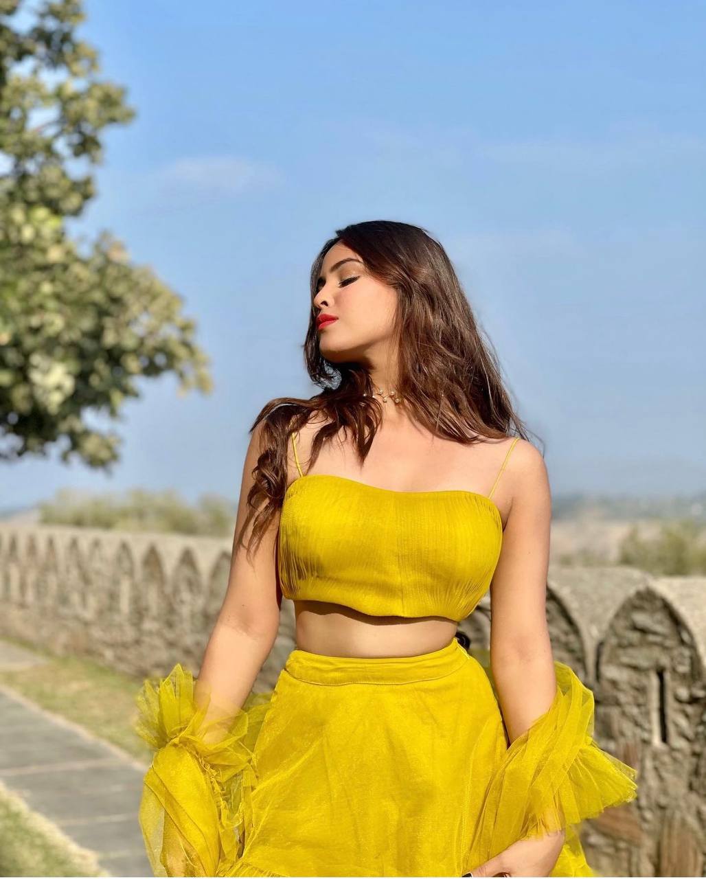 Yellow color designer ruffle lehenga choli - Joshindia